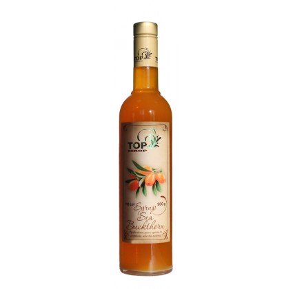 Sea buckthorn syrup in a glass bottle